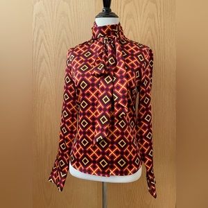 Tory Burch Bow Silk Blouse; a style which the brand revisits every season.